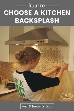 a woman in black and white shirt standing in front of a stove with the words how to choose a kitchen backsplash