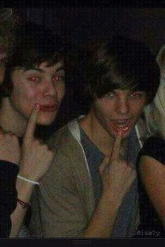 three young people posing for the camera with their hands on their mouths and fingers in front of them