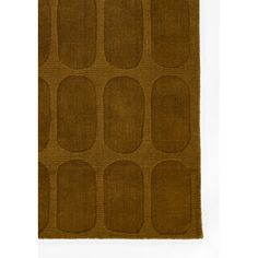 a brown rug with oval shapes on the bottom, and small circles on the top