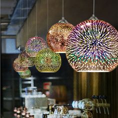 colorful lights hanging from the ceiling in a store