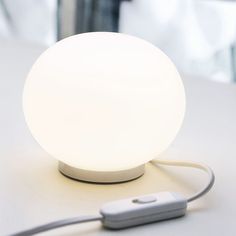 a white light sitting on top of a table