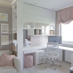 a white desk and chair in a room