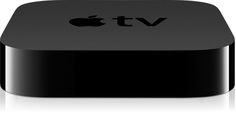 an apple tv sitting on top of a white table