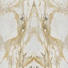 an abstract marble pattern with gold and white colors