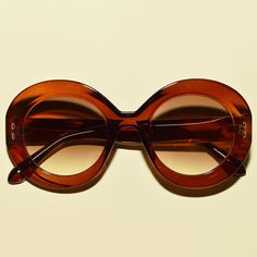 These vintage style PENELOPE sunglasses feature an oversized round lens, provide UV400 protection and have metal detailing. Dimensions: Length: 5 3/8 inches Lens diameter: 2.5 inches Retro Round Sunglasses With Gradient Lenses, Vintage Brown Round Sunglasses, San Gabriel, Retro Mode, Oval Sunglasses, Mode Inspo, 60s Fashion, Mode Vintage, Mode Inspiration