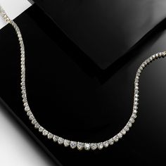 Ross-Simons - 5.50ct t. w. Graduated Lab Grown Diamond Tennis Necklace. 20". It's your time to shine! Our graduated tennis necklace is a forever favorite that comes at an incredible value, glistening from end to end with 5.50 ct. t. w. round brilliant-cut lab-grown diamonds. Crafted in high-polished 14kt yellow gold. Graduates from 1/16" to 1/8" wide. Lab-grown diamonds are identical to mined diamonds according to their optical, physical and chemical properties. All Ross-Simons lab-grown diamond Timeless Tennis Necklace With 17 Jewels For Anniversary, Timeless Jeweled Tennis Necklace For Anniversary, Luxury Single Strand Tennis Necklace For Anniversary, Fine Jewelry Single Strand Tennis Necklace For Anniversary, Luxury Lab Grown Diamond Tennis Necklace, White Gold Tennis Necklace With Diamond Cut Lab-grown Diamonds, Luxury Lab-grown Diamond Tennis Necklace, Lab-grown Diamond Tennis Necklace With Diamond Accents, Classic Formal Tennis Necklace With Lab-grown Diamonds