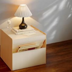 a lamp sitting on top of a wooden table