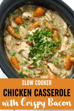 chicken casserole with carrots and parsley in a black crock pot