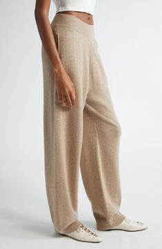 Ribbing at the waistband and cuffs frames these easygoing joggers knit from a luxurious blend of cashmere and wool. 28" inseam; 14" leg opening; 13" front rise; 16" back rise (size X-Small) Elastic waist Ribbed cuffs 75% cashmere, 25% wool Hand wash, dry flat Imported Designer Clothing