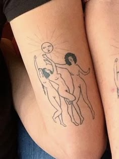 two people with matching tattoos on their legs