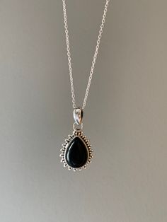 Sterling silver oval black onyx necklace. Also available in other stones. Gift box available for purchase. Search GIFTBOX Silver Oval Onyx Necklace, Silver Onyx Oval Necklace, Oval Gemstone Drop Necklace, Elegant Black Oval Pendant Necklace, Black Teardrop Pendant Necklace With Gemstone, Black Oval Pendant Necklace For Gift, Black Teardrop Pendant Necklace Gift, Classic Oval Onyx Necklaces, Black Sterling Silver Teardrop Pendant Jewelry