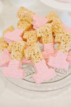 small pieces of rice krispy treats on a glass plate