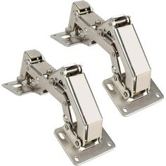 pair of stainless steel cabinet door hinges with two latches on each side