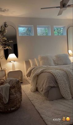 a bedroom with white walls and carpeted flooring