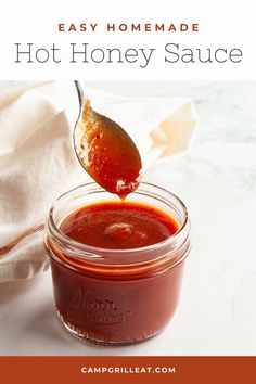 homemade hot honey sauce in a mason jar with a spoon full of it and text overlay that reads easy homemade hot honey sauce