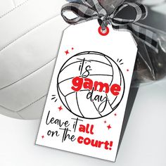 a white soccer ball with a tag that says it's game day leave it all on the court