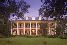 a large white house with columns and windows