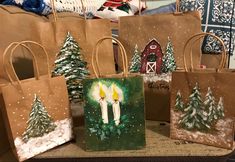 small bags decorated with christmas trees and candles