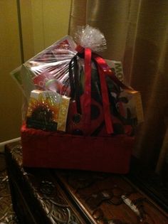 a gift basket sitting on top of a table