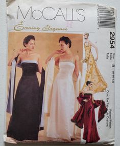 two women wearing evening gowns and one woman in an evening dress sewing pattern on a piece of paper