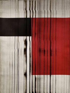 an abstract painting with red, black and white stripes