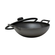 an empty frying pan on a white background