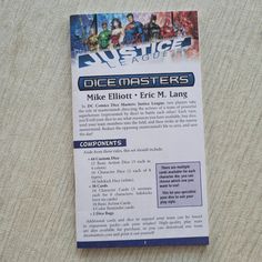 a piece of paper with an advertisement for dice masters on it's back side