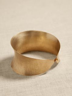 Elegant Brass Cuff Jewelry, Elegant Hand-cast Cuff Jewelry, Elegant Hammered Brass Bangle, Formal Brass Cuff Jewelry, Elegant Hammered Brass Cuff Bracelet, Hand Forged Bronze Metal Bracelets, Artisan Brass Bracelet Jewelry, Formal Hand-forged Bangle Jewelry, Formal Brass Cuff Bracelets