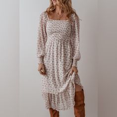 This Romantic Midi Dress Features A Flattering Smocked Bodice With A Delicate Floral Print, Creating A Dreamy Silhouette. The Long, Billowy Sleeves With Smocked Cuffs And The Flowy Tiered Skirt Add A Soft, Whimsical Touch. Perfect For Pairing With Boots Or Layering For Cooler Days, This Dress Is Your Go-To For A Day In The Countryside Or An Evening Gathering. Pineapple Clothes, Holiday Leggings, Liquid Leggings, Floral Squares, Solid Leggings, Judy Blue Jeans, Long Sleeve Midi, Tier Skirt, Customized Blankets