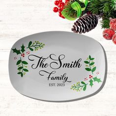 the smith family oval platter with holly and pine cones