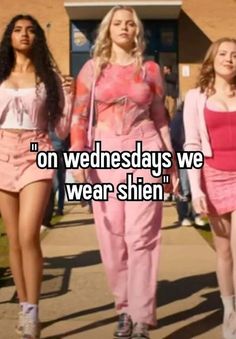 two girls walking down the street with text on wednesdays we wear shen and pink