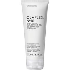 Discover the transformative power of Olaplex No.10 Bond Shaper Curl Defining Gel 200ml. This reparative styling gel is designed for professional hairdressers to enhance and define curls, waves, and coils, providing a flexible, medium hold that leaves hair bouncy, smooth, and crunch-free.  Patented Olaplex Bond Building Technology: Repairs disulfide bonds for stronger, well-defined curls. Curl Retention Compound: Maintains definition, smoothness, and shine. Coconut-Avocado Milk: Fortifies, reduces breakage, and conditions for soft, shiny hair.  How to Use  Apply and evenly distribute a small amount to clean, wet hair in sections. Scrunch in an upward motion to enhance natural curl pattern, or use desired curl-defining technique. Air dry or diffuse until dry. Once dry, gently scrunch to rele Avocado Milk, Define Curls, Soft Shiny Hair, Enhance Natural Curls, Curl Defining, Beauty Supplies, Curl Pattern, Defined Curls, Styling Gel