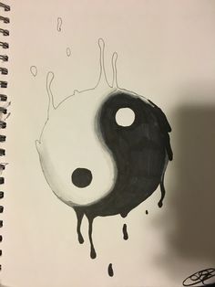 a black and white drawing of a yin - yang symbol with drops of paint on it