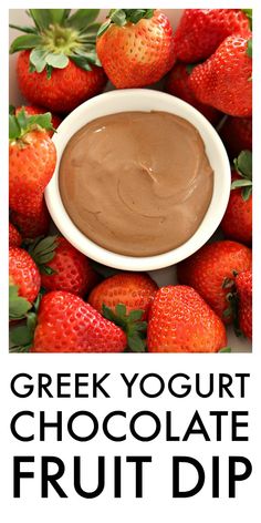 a bowl of chocolate fruit dip with strawberries around it and the words greek yogurt chocolate fruit dip