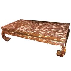 a wooden table with an intricate design on it