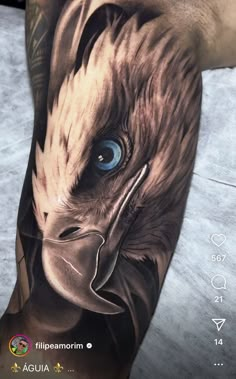 an eagle with blue eyes is shown on the arm and leg, as if it were done