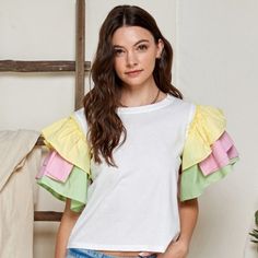 Top Fashion T-Shirt, Featured As Tiered Multi Color Ruffled Sleeve. Round Neckline. Top Only. 95% Cotton, 5% Spandex Spring Cotton Short Sleeve Top With Ruffle Sleeves, Multicolor Cotton Ruffle Sleeve Tops, Multicolor Cotton Top With Ruffle Sleeves, Multicolor Cotton Tops With Ruffle Sleeves, Trendy Summer Short Sleeve Top With Ruffles, Casual Ruffle Sleeve T-shirt For Summer, Casual Summer T-shirt With Ruffle Sleeves, Cotton Short Sleeve Top With Ruffle Sleeves, Trendy Cotton T-shirt With Ruffle Sleeves