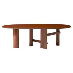 an oval table with two wooden legs and a brown top, on a white background