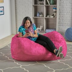 Includes: One (1) beanbag chair Material: Polyester fabric Fill material: Foam Color options: Kiwi green, fuchsia pink, red, or purple Closure: Double zipper Care instructions: Cold wash, removable cover Weight: 20-pounds Dimensions: 26 inches high x 46 inches wide x 34 inches wide Tv Game Room, Alternative Seating, Bean Bag Lounger, Bean Bag Cover, Bean Bag Covers, Cozy Pillow, Online Furniture Shopping, Noble House, Bag Chair