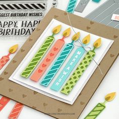 a birthday card with some candles on it