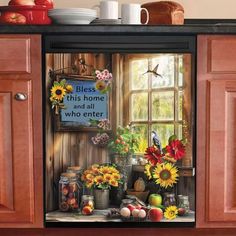 an open cabinet with sunflowers and other flowers