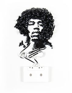 a black and white photo of a man's face on a light switch cover