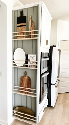 the kitchen is clean and ready to be used as a storage space for dishes, knives, and other items