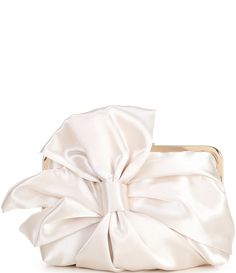 From Antonio Melani&#x2C; the Vertical Bow Frame Clutch features:ManmadeFrame closureApprox. 24" removable crossbody strap dropGold-plated hardware finishOne interior back wall slide pocketApprox. 9" x 5.5" x 2"Imported. 2024 Wardrobe, Prom Clutch, Bow Purse, Bow Clutch, Clutch Bag Wedding, Classic Lolita, Wedding Clutch, Prom Inspo, Antonio Melani