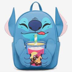 a blue backpack with a cartoon character holding a drink