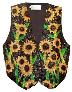 This sequin vest is handmade, high quality, original design and beautiful. Sequin vests are suitable for party, events or any occasional use. All sequin vests close with snaps in the front and the back is solid black with a strap to adjust the vest to your desired fit. Fitted Sequin Vest For Spring, Sequined Fitted Vest For Spring, Fitted Embellished Vest For Fall, Fitted Black Sequined Vest, Fitted Sequin Vest For Party Season, Sleeveless Sequined Vest For Fall, Sleeveless Fall Vest With Sequins, Fall Sleeveless Vest With Sequins, Fitted Sleeveless Vest For Festival