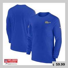 a blue long - sleeved shirt with the words nfl shop on it and an image of