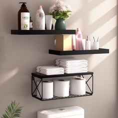 two shelves with towels, toiletries and soaps on them