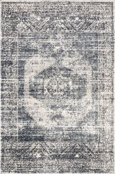 an area rug with grey and white colors