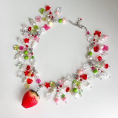 "Strawberry Necklace, Beaded Maximalist Necklace, Cottagecore Mismatched Necklace, Red Green Necklace, Y2K Necklace, Summer Necklace, Funky ♡IMPORTANT: - Listing is for 1 necklace - Video without filters  - Handmade jewelry made in smoke-free studio. ♡SIZE: - This necklace is made in 17.7\" length or 45 centimeters (adjustable) - The size of the choker is standard, but if you need a specific size, write it in the notes to the order or in a message. ♡GIFT - Gift for buying 2 or more items in our store ♡SHIPPING - We send from Bulgaria - We ship all orders with a track number and do expedited shipping, but due to the pandemic, orders delivery may still take longer time - Your item will be dispatched within 3 working days - Please see our shop policies for full details ♡COLORS: - Colors may v Maximalist Necklace, Y2k Maximalist, Necklace Video, Day Before Valentines Day, Cottage Core Fashion, Strawberry Necklace, Necklace Y2k, Y2k Necklace, Diy Collier